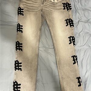 Stylish Beige Jeans with Black Accents
